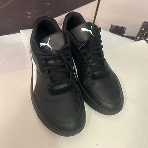 Puma low top black with white puma sign size 11.5